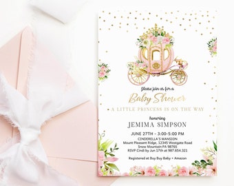 May include: Baby shower invitation featuring a pink Cinderella carriage with floral accents and gold details. The invitation includes the text "Please join us for a Baby Shower" and event details. A pink envelope with a white ribbon is in the background.