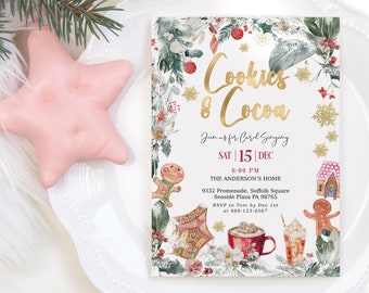 May include: A Christmas invitation with gold text that reads "Cookies & Cocoa". The invitation features watercolor illustrations of gingerbread men, houses, and mugs of cocoa, surrounded by festive greenery and red ornaments. A pink star-shaped decoration is on the left.