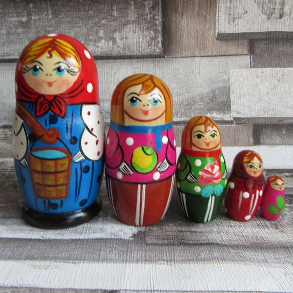 Tradtional wooden Nesting doll / Stacking dolls design is called Pail of water unusual gift idea