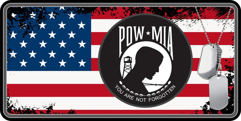 May include: A distressed American flag with a black circle containing the POW MIA logo and the text "You are not forgotten". Two silver dog tags hang from a silver chain.