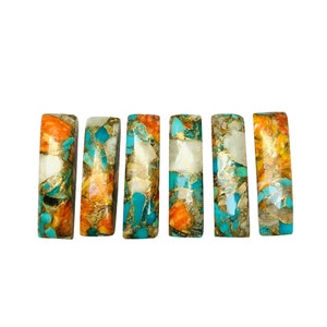 May include: Six rectangular gemstone cabochons with a mix of turquoise, orange, gold, and white colors. The cabochons are smooth and polished.