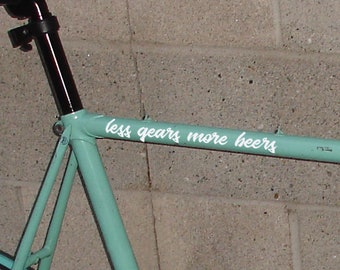 Two "less gears more beers" bicycle stickers