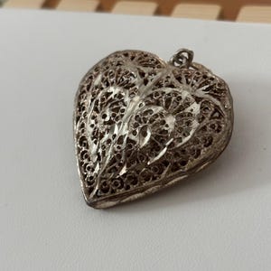 Beautiful sterling silver filigree heart pendant