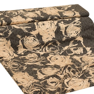 May include: A fabric with a dark brown background and a pattern of beige roses. The roses are stylized and have a slightly distressed look.