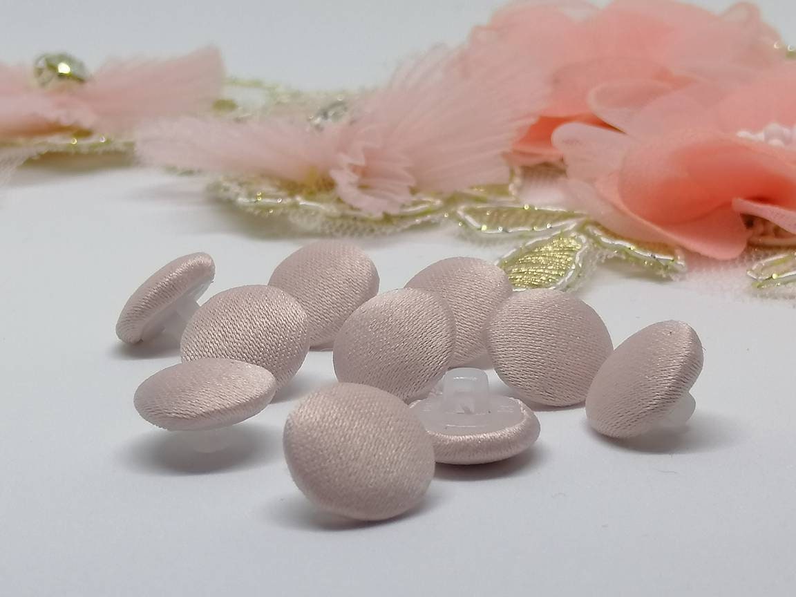 satin covered buttons for wedding dress Thinking about adding some silk covered buttons to your wedding dress?, Enjoy some relaxing sewatching as I sew a few million of them onto a detachable train Ive made for a very special bespoke bride