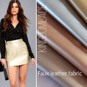 Può includere: Una minigonna in similpelle dorata con una camicetta a pois neri. Il tessuto è mostrato in tre colori: oro, argento e oro rosa. Il testo "KINGDOMLACE" e "Faux leather fabric" è visibile.