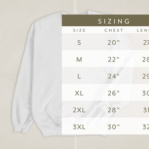 May include: Sizing chart for a sweatshirt with measurements in inches for chest and length. Sizes include S, M, L, XL, 2XL, and 3XL.