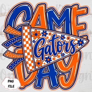 May include: A digital graphic design featuring the text GAME DAY in bold blue and orange letters. A white pennant with a checkered orange and white border, blue and orange flower patterns, and the word Gators in blue script is centered.