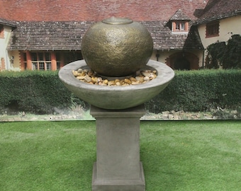 large patio ball fountain with classic plinth