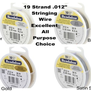 May include: Four spools of Beadalon 19 strand 0.012 inch bead stringing wire. The spools are labelled with the colours: Silver, Bright, Satin Gold, and Satin Silver. Each spool contains 30 feet (9.2 metres) of wire.