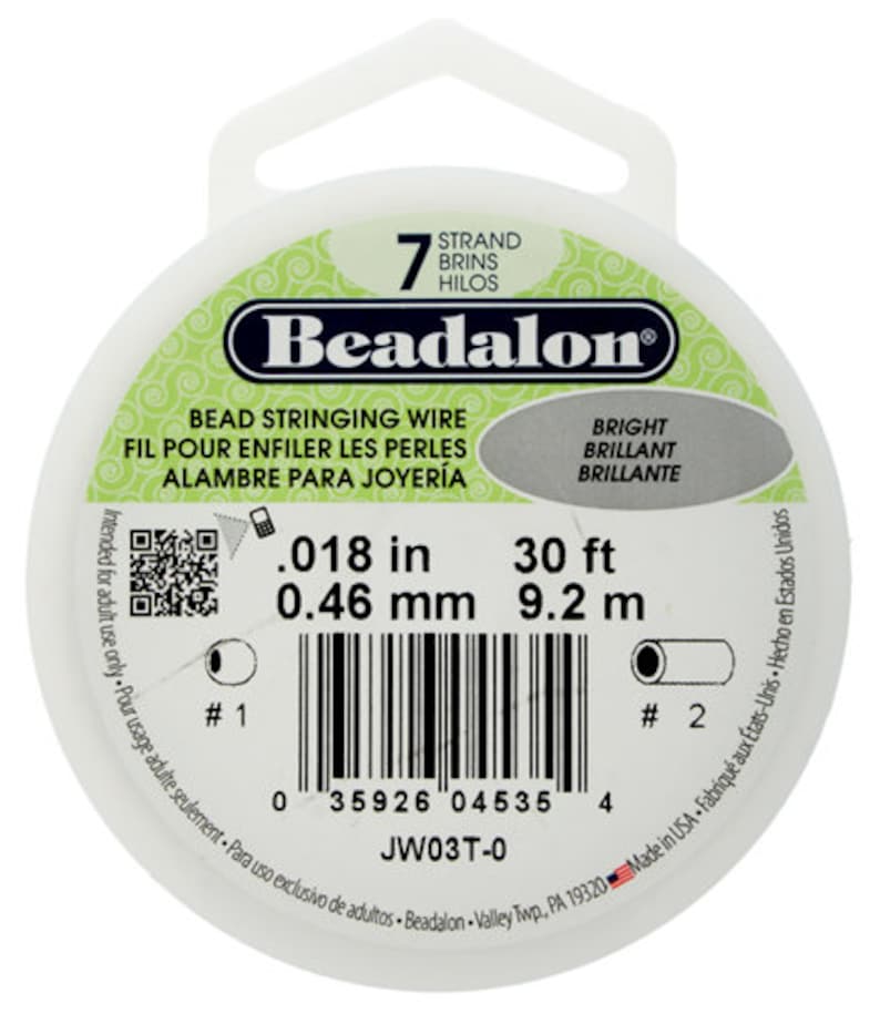 May include: A white spool of Beadalon bead stringing wire. The package includes the text "7 Strand", "Bright", and measurements of .018 in, 30 ft, and 0.46 mm, 9.2 m. The product is made in the USA.