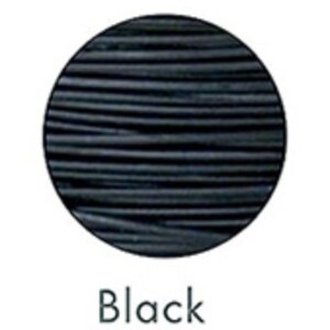 May include: A black, round object with horizontal lines, set against a white background. The word "Black" is written in a simple, sans-serif font below the object. The object appears to be a sample of a material or product.
