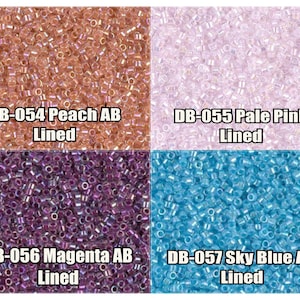 May include: Four different colors of seed beads, each with a different color iridescent finish. The colors are peach, pale pink, magenta, and sky blue. Each color is labeled with a product code and the words "Lined" and "AB".