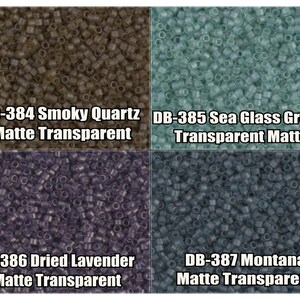 May include: Four different colors of seed beads, each in a separate square. The colors are smoky quartz, sea glass green, dried lavender, and montana. Each color is labeled with its name and the words "Matte Transparent".