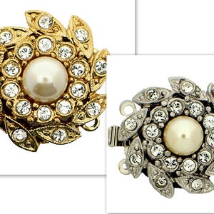 May include: Two ornate, decorative clasps for jewelry making. One is gold with a pearl and clear rhinestones. The other is silver with a pearl and clear rhinestones.