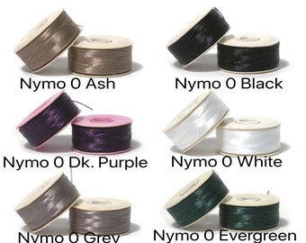 May include: Six spools of Nymo thread in various colors: ash, black, dark purple, white, gray, and evergreen.