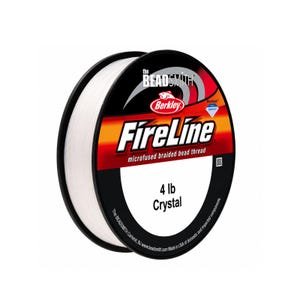 May include: A spool of white FireLine microfused braided bead thread by The Beadsmith. The black label features the Berkley logo, the text 4 lb Crystal, and branding details. The spool contains thin, white synthetic cord for jewelry making.