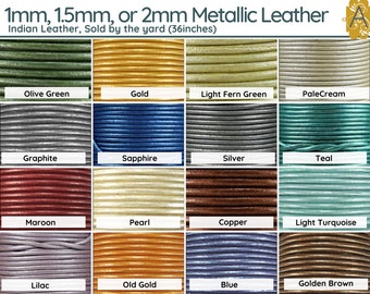 May include: A selection of metallic leather cords in various colors, including olive green, gold, and sapphire. The image displays spools of leather cord in 1mm, 1.5mm, and 2mm thicknesses, sold by the yard (36 inches). Other colors include teal, copper, and lilac.