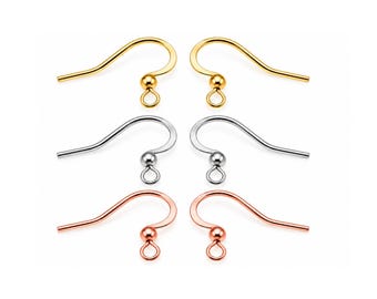 May include: A set of six earring hooks arranged in three pairs of different metallic finishes. The top pair is gold, the middle pair is silver, and the bottom pair is rose gold. Each hook features a small ball accent and a circular loop.