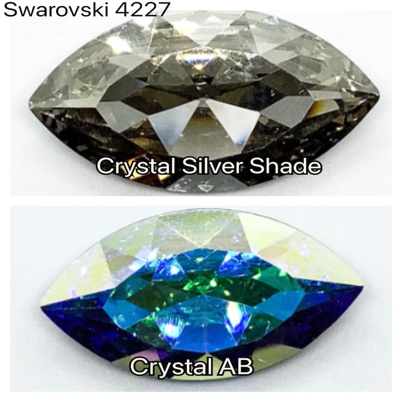 Peut inclure: Deux pierres en cristal Swarovski 4227. La pierre du haut est de couleur argent&eacute;e. La pierre du bas est un cristal AB, qui a une finition bleue, verte et iris&eacute;e.