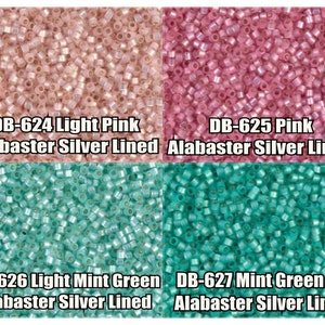 May include: Four close-up images of seed beads. The beads are in four colors: light pink, pink, light mint green, and mint green. Each image has text below it that identifies the color and bead code. The text reads: DB-624 Light Pink Alabaster Silver Lined, DB-625 Pink Alabaster Silver Lined, DB-626 Light Mint Green Alabaster Silver Lined, DB-627 Mint Green AB Alabaster Silver Lined.