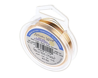 May include: A spool of 15 yards (13.71 meters) of 24 gauge gold-colored Artistic Wire. The wire is 0.020 inches (0.51 mm) in diameter. The spool is labeled "Artistic Wire" and "Gold Color, Doré, Color Dorado".