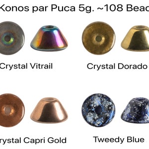 May include: Four pairs of glass beads, each pair showing a round bead and a cone-shaped bead. The beads are in the colors: gray, iridescent, gold, copper, blue with white flecks, and dark blue with white flecks. The text "Konos par Puca 5g. ~108 Beads" is at the top of the image. The text below each pair of beads identifies the color: "Crystal Vitrail", "Crystal Dorado", "Crystal Capri Gold", and "Tweedy Blue".