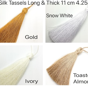 May include: Four silk tassels in different colours: gold, snow white, ivory, and toasted almond. Each tassel is 11 cm (4.25 inches) long and thick.
