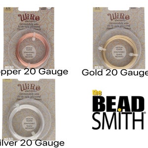 May include: Three spools of 20 gauge German-style wire in copper, gold, and silver. The wire is packaged in clear plastic with a white label that reads "Wire elements German-style wire".