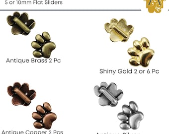 May include: Paw print sliders in antique brass, shiny gold, antique copper, and antique silver. The sliders are 5 or 10 mm flat sliders.  "Paw Print Sliders" and "5 or 10mm Flat Sliders" are written in black text at the top of the image.