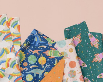Dino Daydreams Quilting Cotton: Dinosaur Rainbow Kids Fabric