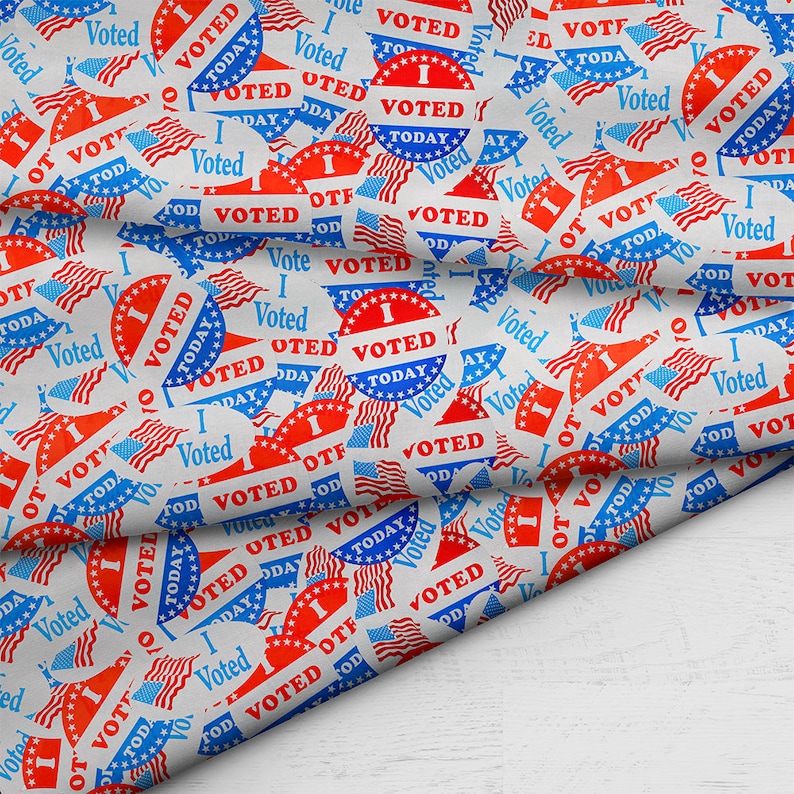 May include: A white fabric with a repeating pattern of red, white, and blue "I Voted Today" stickers. The stickers feature a stylized American flag design.