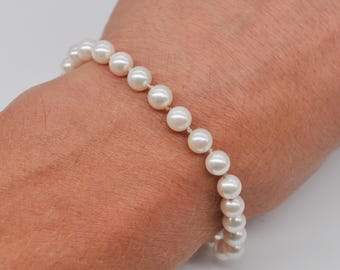 Vintage Faux Pearl Bracelet with 925 Sterling Silver Clasp. Length: 18.5 cm / 7.2 inch.