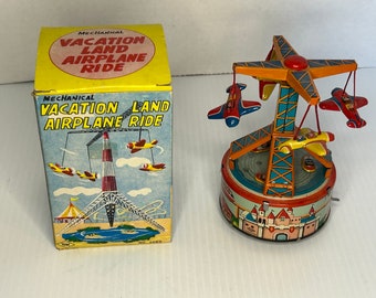 Yone Mechanical Vacation Land Airplane Ride with Original Box