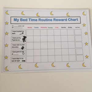 May include: A white printable chart with a blue title "My Bed Time Routine Reward Chart". The chart has a grid with days of the week and a column for total points. There are five yellow stars and four yellow crescent moons on the chart. The chart has a list of bedtime activities with icons: brushing teeth, putting on pajamas, reading a bedtime story, going to bed, and sleeping in bed all night.