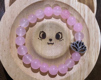 Pulseira de contas de cristal de quartzo rosa com pingente espaçador de lótus