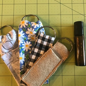 Key ring essential oil holder