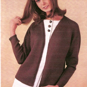 May include: A brown cardigan with a V-neck and long sleeves. The cardigan is open in the front and has three buttons.