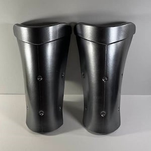 Red Hood or Dr. Doom shin armor. adjustable straps and clips.