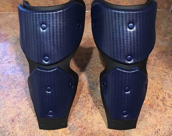 Deathstroke forearm armor blue carbon fiber print.