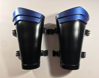 Nightwing gauntlets forearm armor with adjustable straps.