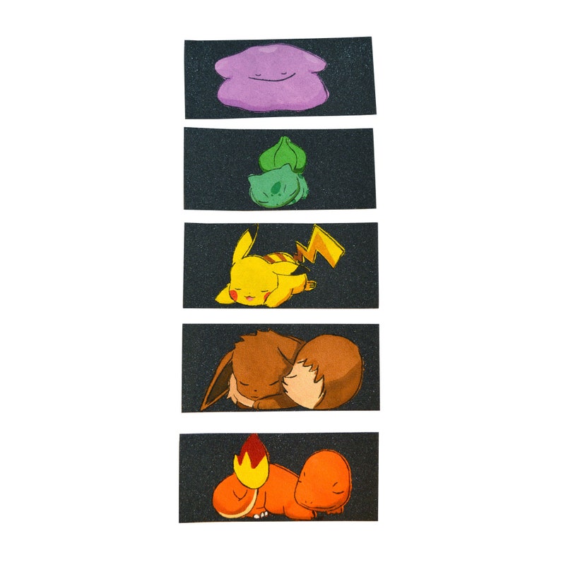 May include: Five black and white illustrations of Pokemon characters. The characters are sleeping and include a purple blob, a green creature, a yellow Pikachu, a brown Eevee, and a red and orange Charmander.