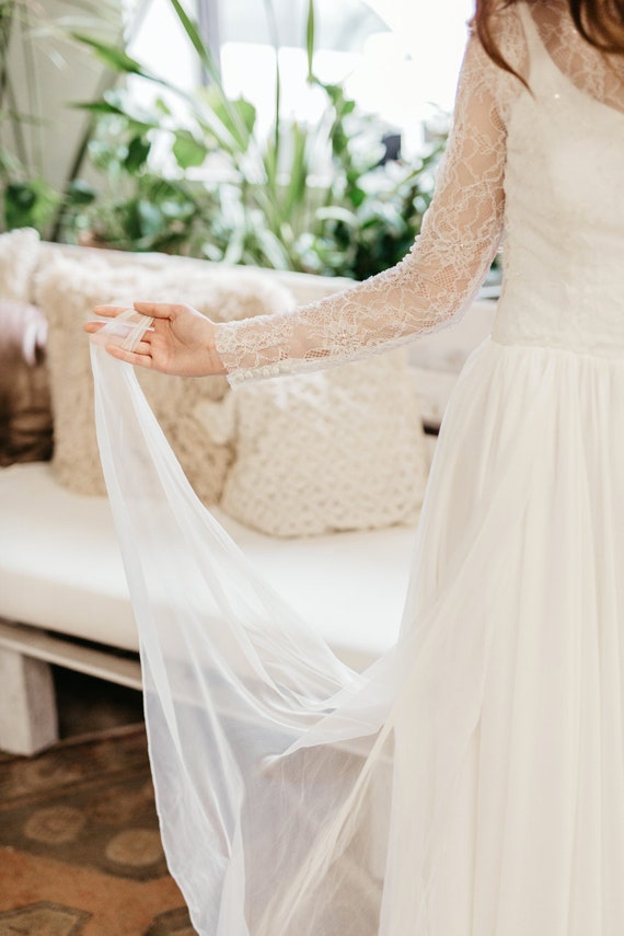 Buy > long flowy sleeve wedding dress > in stock
