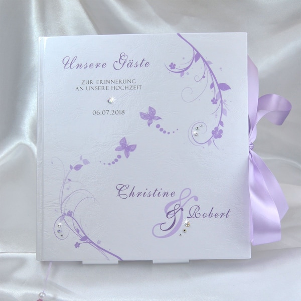 personalisiertes Gästebuch zur Hochzeit in Flieder / Lila / Lavendel im floralen Design mit Schmetterlingen; Blanko oder mit Gästefragen