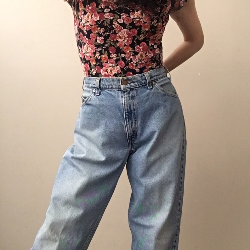 Vintage Levi\u2019s 560 orange tab high waisted mom jeans size 33 34