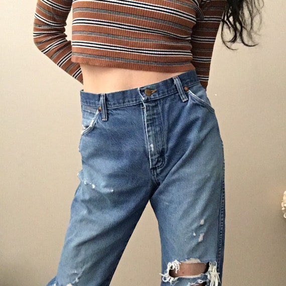 high waisted shredded jeans