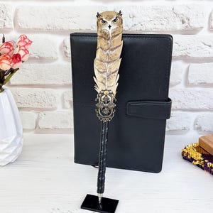 May include: A distressed wooden sign, inscribed with "Welcome to our home" in white lettering. The sign has a rustic finish, ideal for a porch or hallway, creating a welcoming atmosphere.