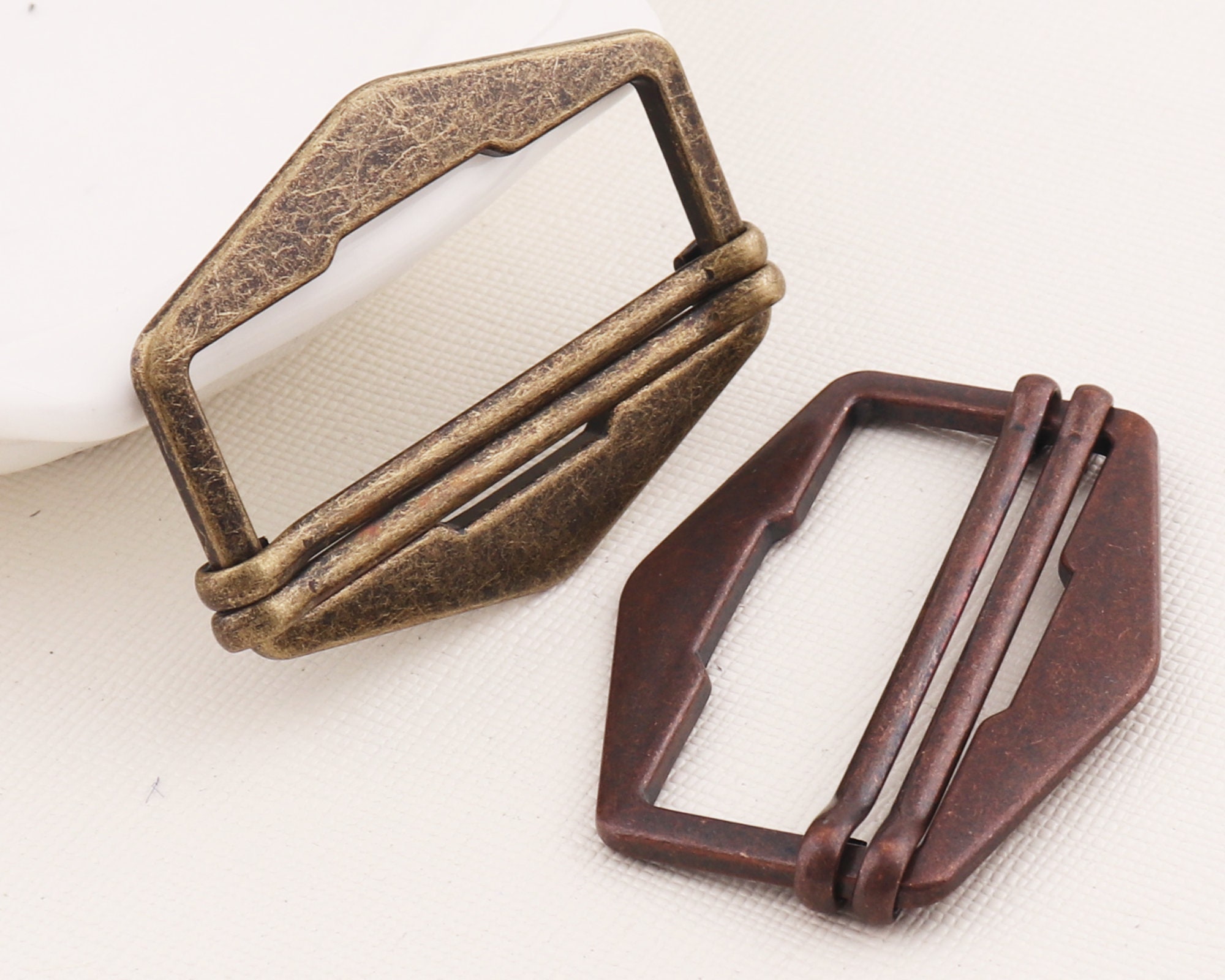 Adjustable shop slide buckles