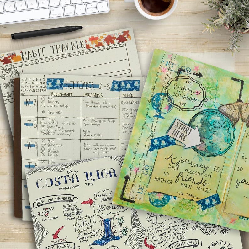 May include: A colorful journal with a mixed media design featuring a world map, a butterfly, and the text "Embrace the Journey". The journal also includes the quote "A journey is best measured in friends rather than miles - Tim Cahill".