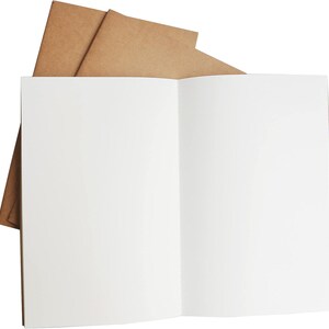 May include: A blank, white notebook with a brown paper cover. The notebook is open to a blank page.
